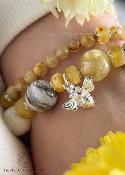 Набір браслетів з каменів жовтих,  теплих кольорів 