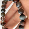 Браслет з темним сонячним каменем, гематитом, соколиним оком, бичим око