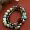 Набір браслетів з натуральної бірюзи та бурштина 
