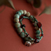Набір браслетів з натуральної бірюзи та бурштина 
